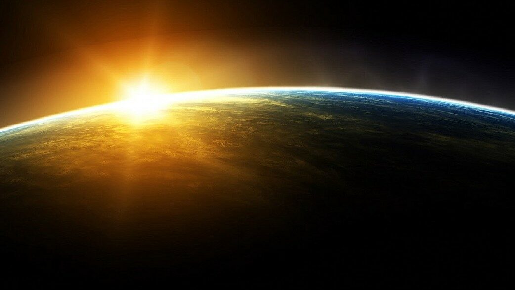 sol brilha na atmosfera terrestre